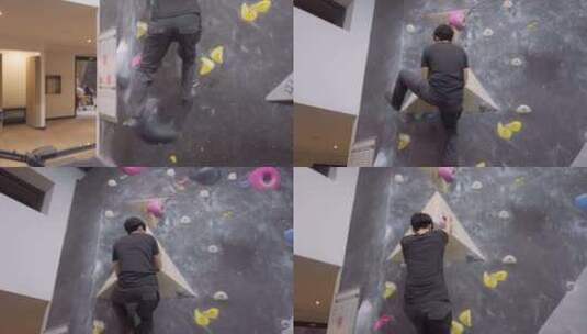 亚洲登山者家伙在健身房爬上室外抱石墙高清在线视频素材下载