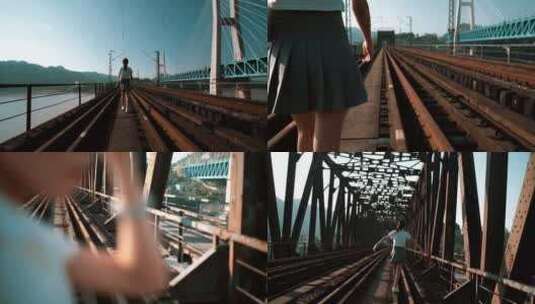 独自行走在火车轨道上的小姐姐高清在线视频素材下载