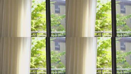 风吹窗帘窗户白色窗帘飘动阳光透过白色窗帘高清在线视频素材下载