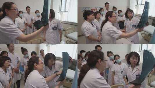 医生医院内探讨X光片高清在线视频素材下载