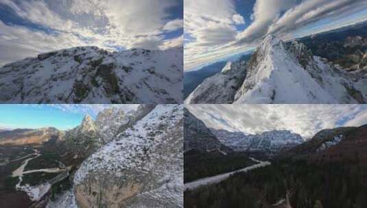 FPV穿越机无人机航拍雪山森林云朵蓝天山脉高清在线视频素材下载