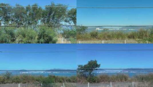 火车窗外的风景移动的风景旅途路上沿途风景高清在线视频素材下载