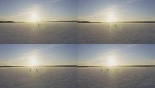 航拍冰原上滑冰高清在线视频素材下载