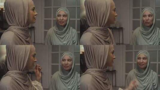 两名戴头巾的穆斯林年轻女性谈到去清真寺高清在线视频素材下载