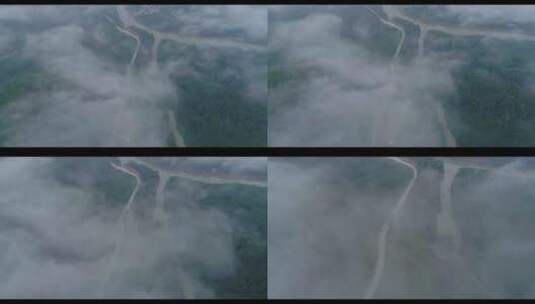 云雾缭绕群山山中公路河流美景航拍01高清在线视频素材下载