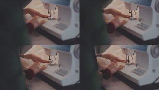 女人用缝纫机缝衣服高清在线视频素材下载