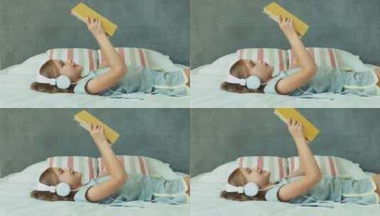 女孩在床上看书高清在线视频素材下载
