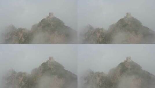 云雾中的长城烽火台航拍高清在线视频素材下载