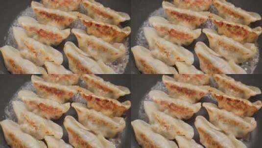 锅上的煎饺高清在线视频素材下载