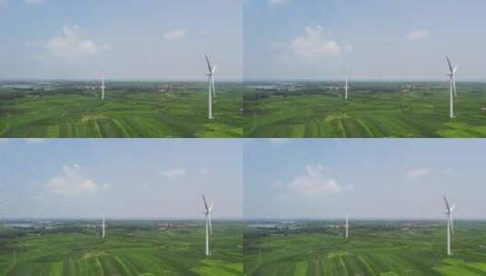 4k 航拍户外绿色风力发电机特写高清在线视频素材下载