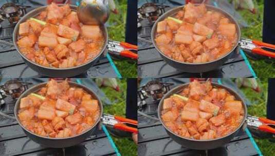 四川阿坝川西高原徒步旅行露营者烹饪红烧肉高清在线视频素材下载