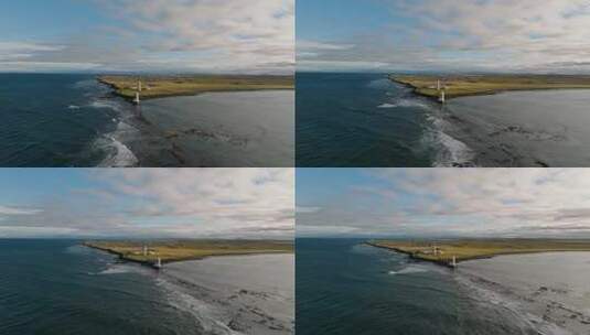 冰岛加尔乌尔老灯塔的鸟瞰图，对着太阳拍摄高清在线视频素材下载