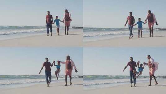 非裔美国人快乐的非裔美国人祖父，父子在海滩上散步的视频高清在线视频素材下载