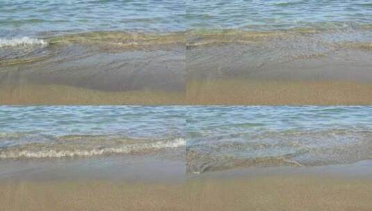 透明的海水冲刷金色沙滩高清在线视频素材下载