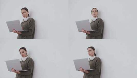 在笔记本电脑上工作的年轻女子高清在线视频素材下载