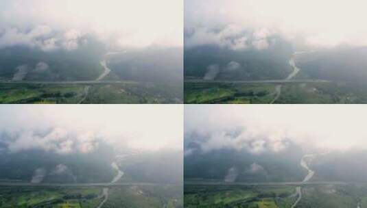桂林云雾缭绕的山谷中穿行的高速公路高清在线视频素材下载