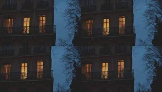 黄昏时从公寓窗户透出的光高清在线视频素材下载