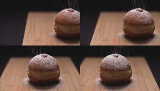 在果冻甜甜圈上撒上糖粉高清在线视频素材下载