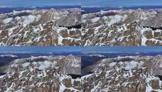 航拍四川岷山山脉雪宝顶雪山山脊上的登山队高清在线视频素材下载