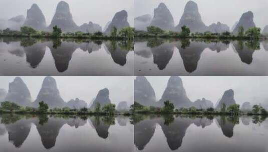 雨天湖景倒映绿树青山的宁静画面高清在线视频素材下载