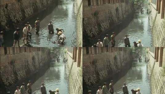 70年代80年代挖淤泥疏通河道高清在线视频素材下载