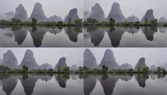 雨天湖景倒映绿树青山的宁静画面高清在线视频素材下载