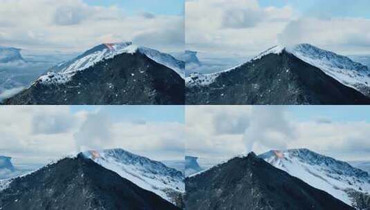 山顶冒着烟雾的雪山景象高清在线视频素材下载