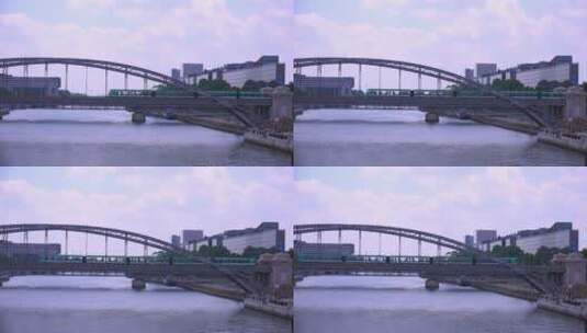 地铁列车穿过巴黎塞纳河上的一座桥高清在线视频素材下载