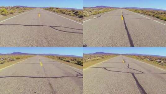 视点拍摄沿着沙漠公路快速行驶高清在线视频素材下载