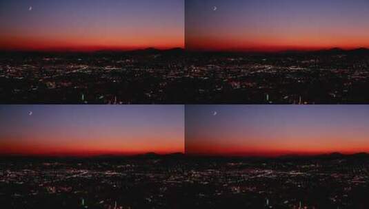 夜晚日落照在都市上空高清在线视频素材下载