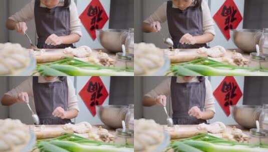 包饺子的中国女孩高清在线视频素材下载