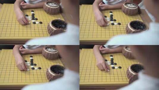 坐在地上下围棋的女孩高清在线视频素材下载