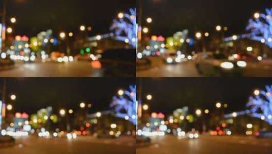 街道上空的城市灯光模糊高清在线视频素材下载
