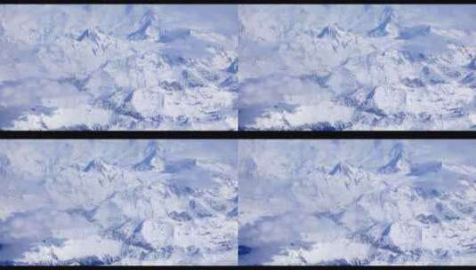 航拍飞机在雪山上空飞行高清在线视频素材下载
