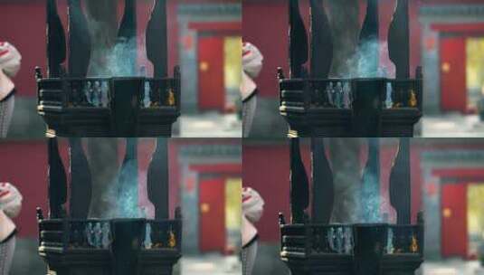 4K实拍北京深秋红螺寺燃烧的香炉和金黄秋叶高清在线视频素材下载