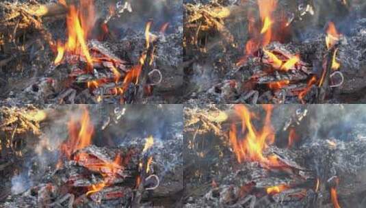 4K烧火焚烧木材枯枝草垛秸秆火焰特写高清在线视频素材下载