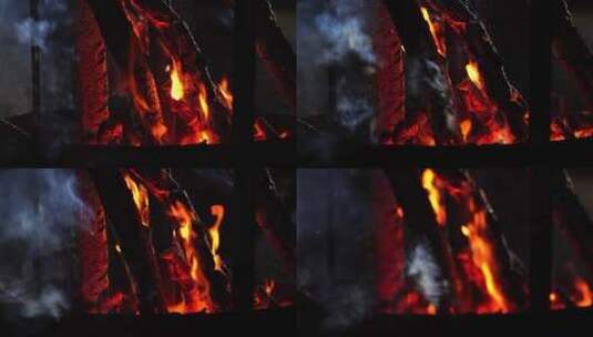 夜晚燃烧的篝火形成木炭取暖高清在线视频素材下载