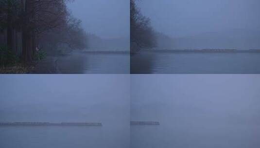 清晨浓雾中的杭州西湖和船舶唯美宁静高清在线视频素材下载