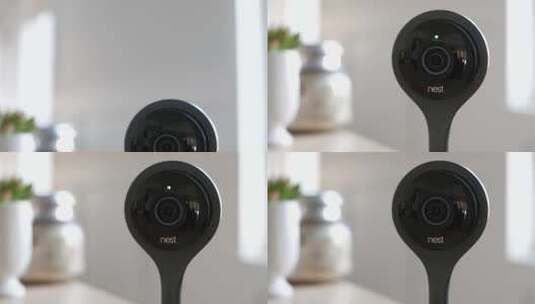 向下倾斜显示Nest Dropcam的特写镜头，因为它开始录制动作。-供编辑使用。高清在线视频素材下载