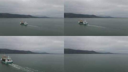 无人驾驶飞机拍摄到一艘渔船起航。高清在线视频素材下载