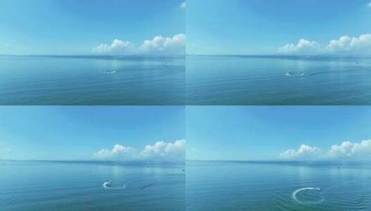 航拍蓝色海洋碧海蓝天航行的海上游轮高清在线视频素材下载