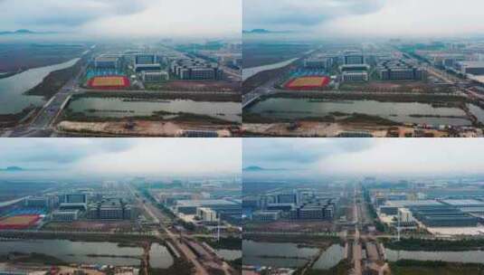 雾霾笼罩下的台州湾新区，城市雾霾中的建筑高清在线视频素材下载