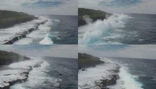 航拍海浪在暴风雨前撞击荒岛的岩石悬崖。高清在线视频素材下载