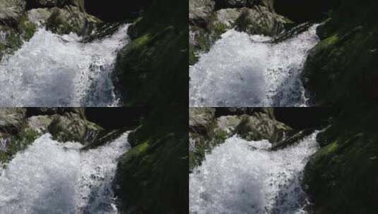 阳光下清澈瀑布水珠喷洒升格空镜高清在线视频素材下载
