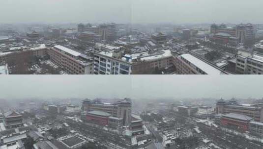 陕西省西安市正在下雪的西安鼓楼雪景景观高清在线视频素材下载