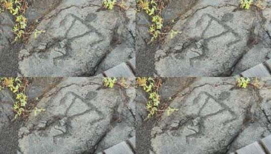 古夏威夷熔岩中的人体简笔画雕刻。高清在线视频素材下载