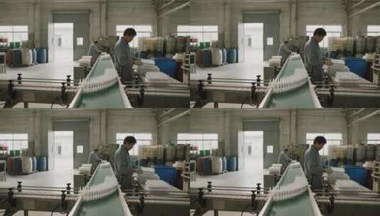 工厂工人在流水线作业高清在线视频素材下载