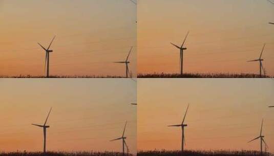 夕阳湖泊风力发电机组乡村振兴环保能源高清在线视频素材下载