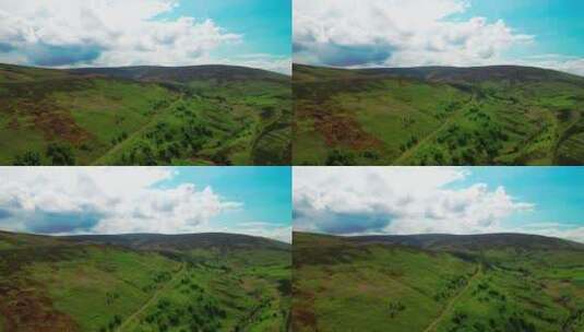 空中景观展示了英国湖区郁郁葱葱的青山，明高清在线视频素材下载