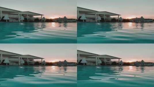 黄昏度假酒店泳池的波光高清在线视频素材下载